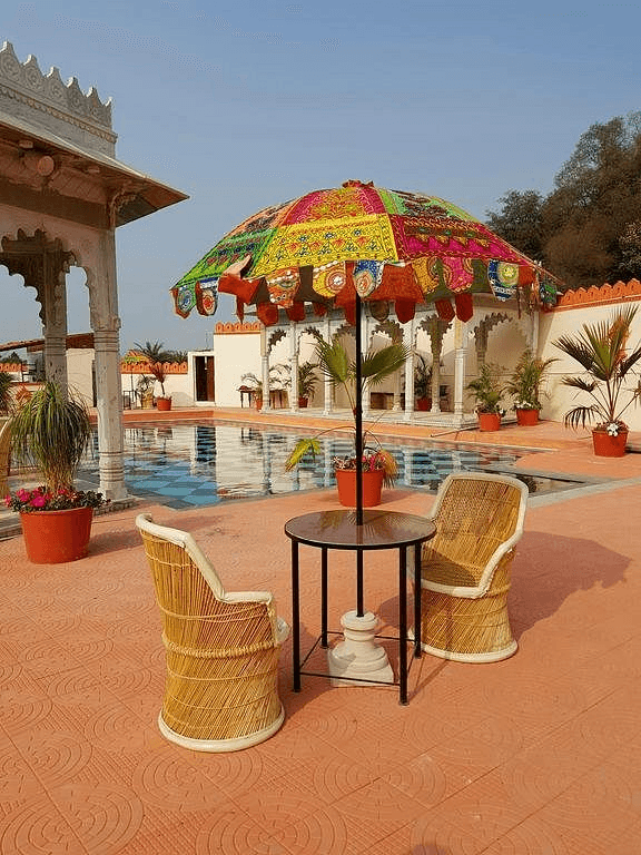 Terrace party banquet under colorful Rajasthani umbrellas